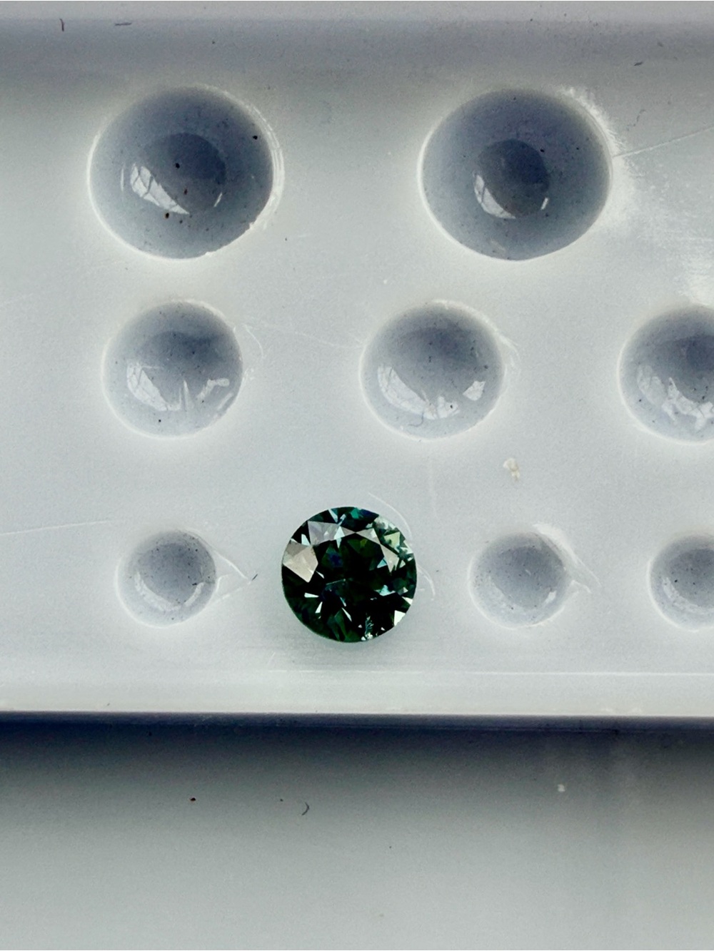 Round Faceted Blue Sapphire gemstone.36 carats